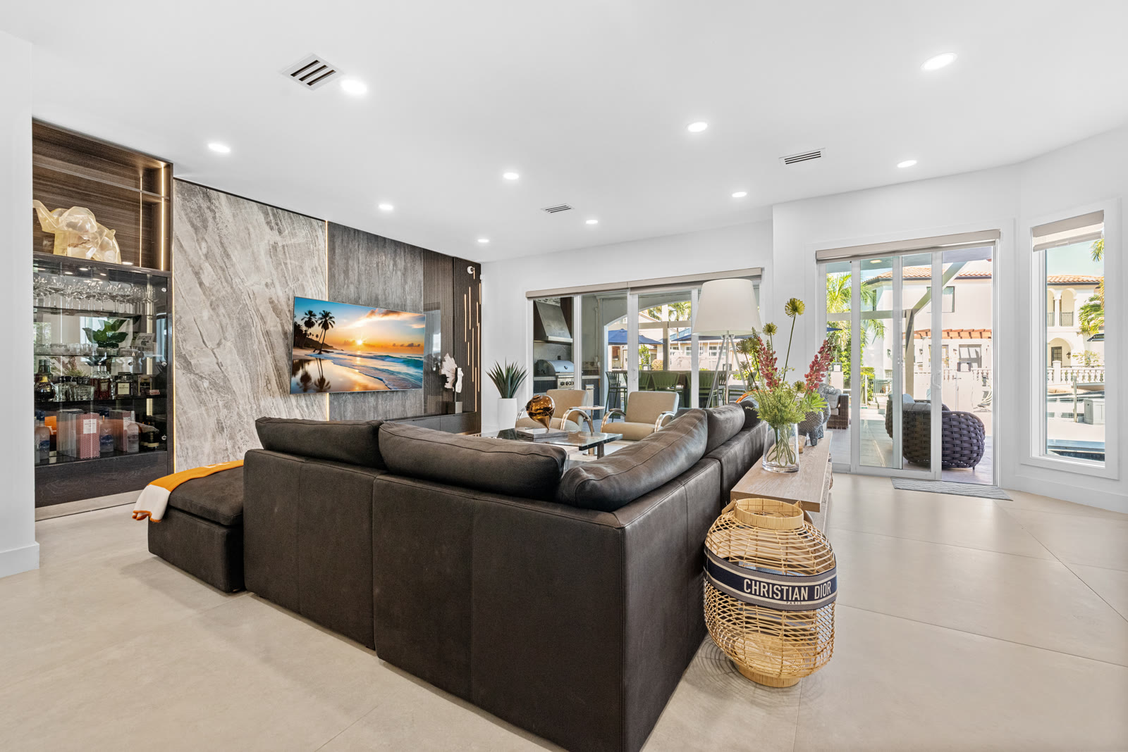 Living room and entertainment area, alternate angle, in a Boca Raton home