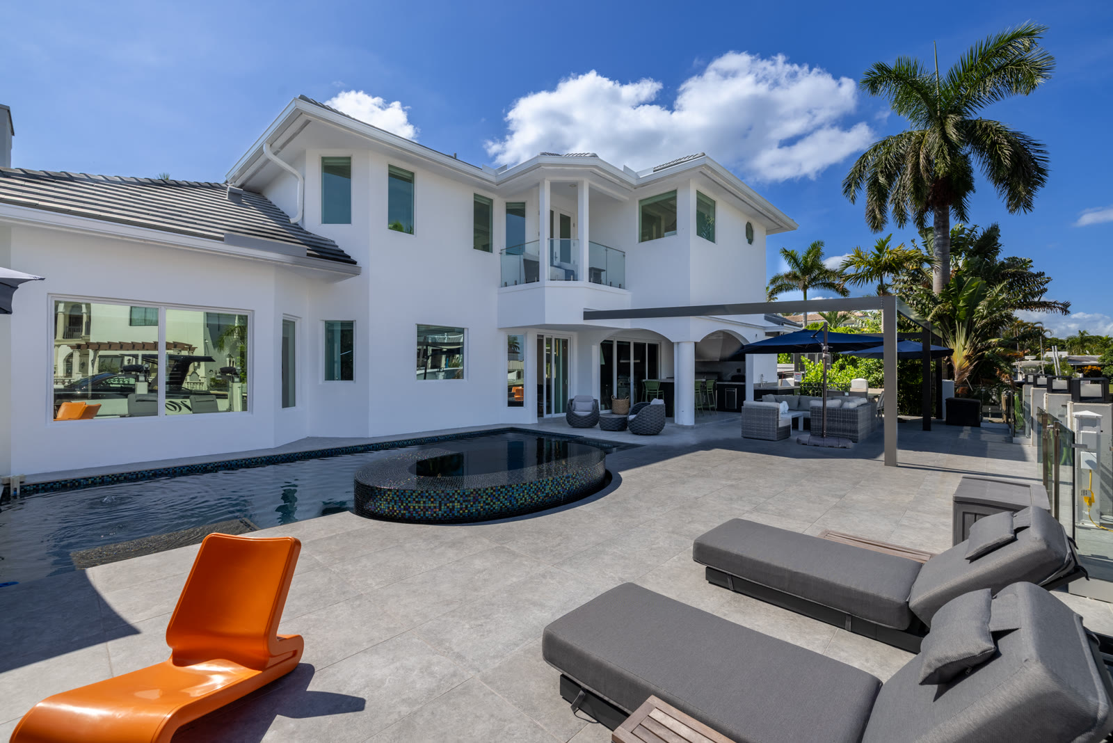 Waterfront pool and outdoor entertaining area at 767 Harbor Isle Dr., Boca Raton