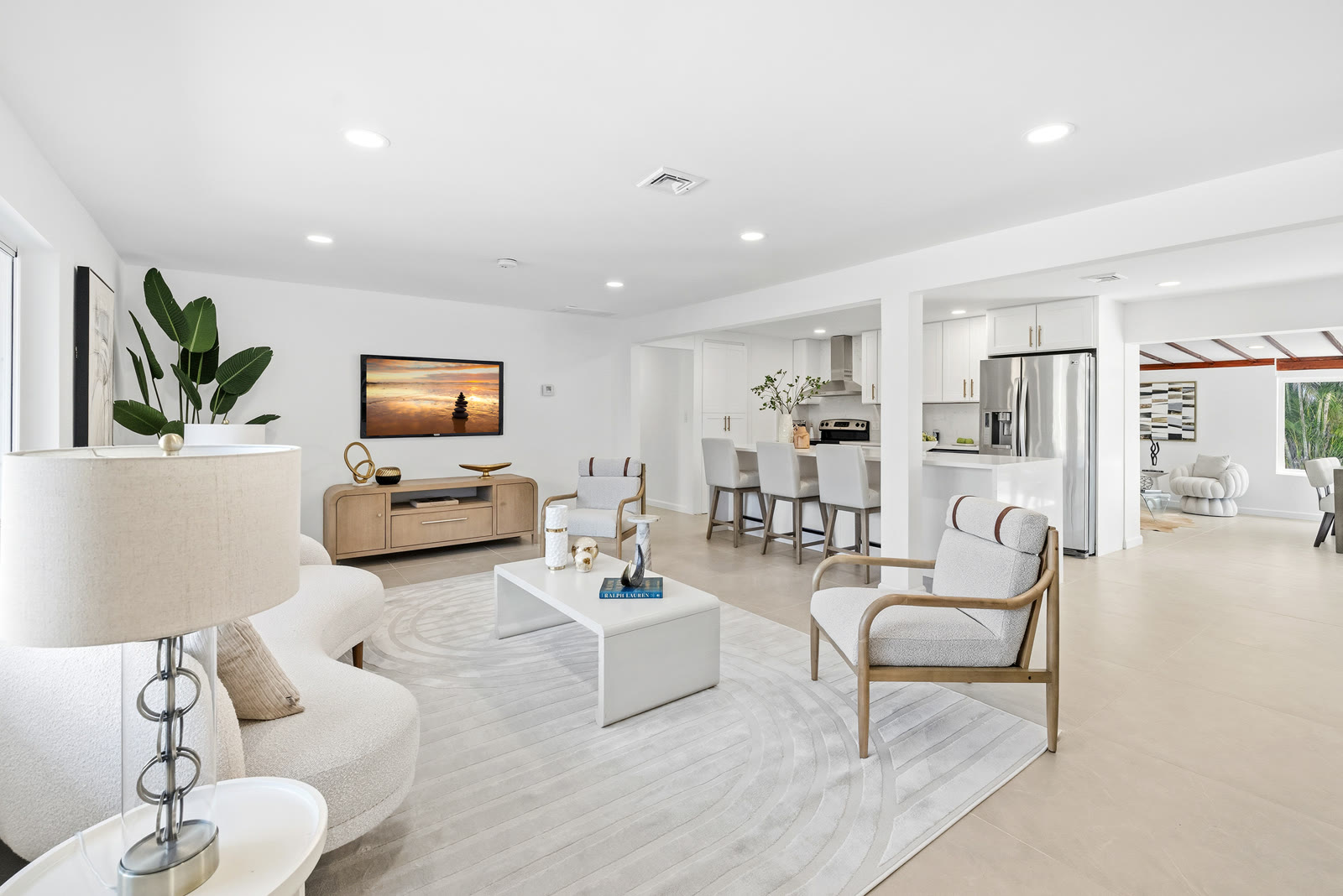 White modern open concept living room and kitchen
